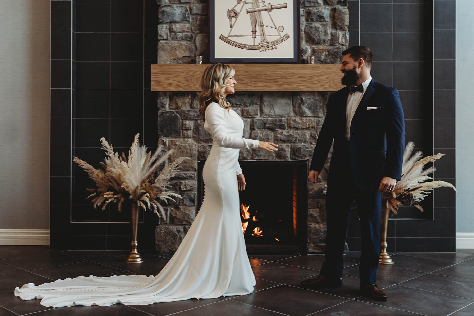 Bride and Groom by Fireplace